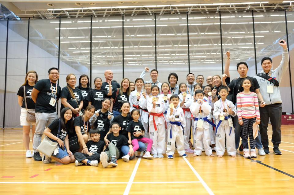 VICTORY. The Phiippine team, their coaches, and family members. Photo from Donnie Geisler Taekwondo Training Center Facebook page 