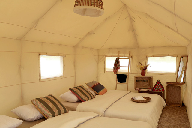 SAFARI TENT. Luxury meets the outdoors at Wonderfruit. Bell tents (with fans or air-conditioning) and this safari tent are among your boutique camping options. Photo from Wondefruit.com 