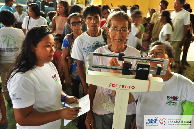 FIGHTING TB. Health workers take vital signs of residents during the tuberculosis caravan at Sta Cruz, Ilocos Sur. Photo from 
Philippine Business for Social Progress 