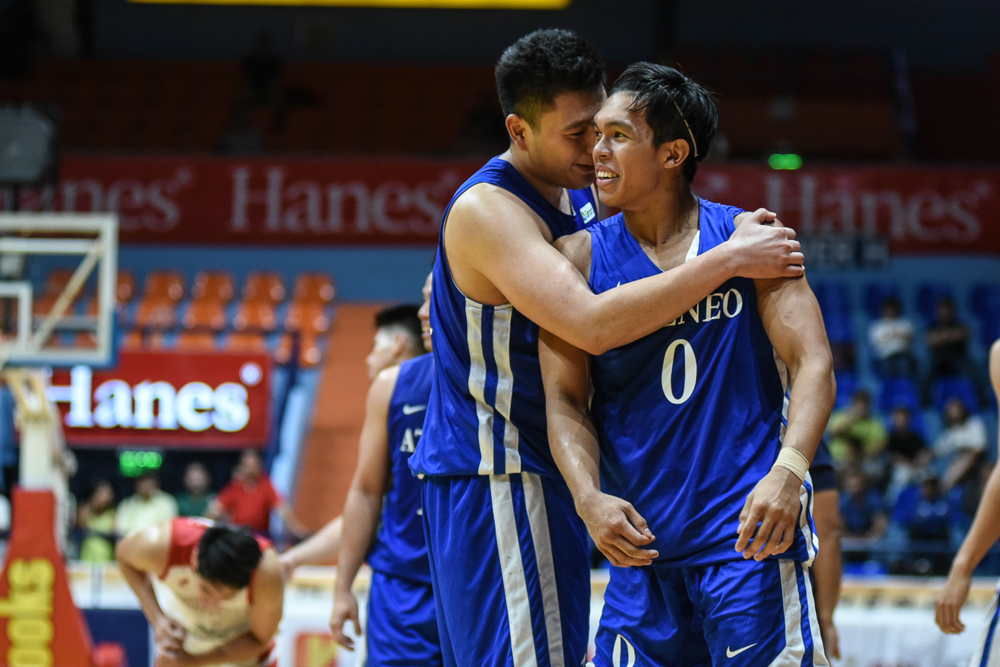 LUCKY. Ateneo's Isaac Go and Thirdy Ravena celebrate the Blue Eagles' one-point escape against San Beda. Photo by Jerrick Reymarc/Rappler 