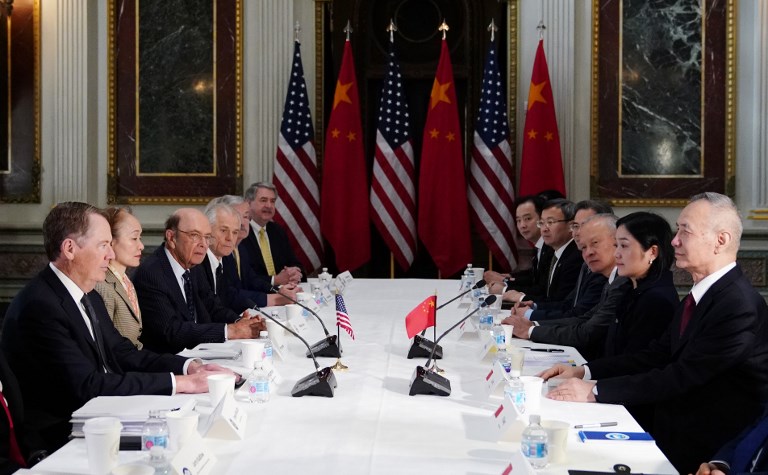 TRADE TALKS. In this file photo, US Trade Representative Robert Lighthizer (L) takes part in US-China trade talks with China's Vice Premier Liu He (R) in the Eisenhower Executive Office Building on February 21, 2019 in Washington, DC. File photo by Mandel Ngan/AFP  
