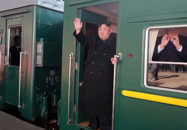TRAIN RIDE. This picture taken on February 23, 2019, and released from North Korea's official Korean Central News Agency (KCNA) on February 24, 2019, shows North Korean leader Kim Jong-un (C) departing Pyongyang Station for the second North Korea-US summit meeting in Hanoi, Vietnam. Photo by KCNA via KNS/AFP  