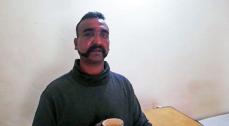 ABHINANDAN VARTHAMAN. The Indian pilot is returned to his home country as a 'peace gesture' by Pakistan. This handout photograph released by Pakistan's Inter Services Public Relations (ISPR) on February 27, 2019, shows the captured Indian pilot in the custody of Pakistani forces in an undisclosed location. AFP PHOTO / INTER SERVICES PUBLIC RELATIONS  