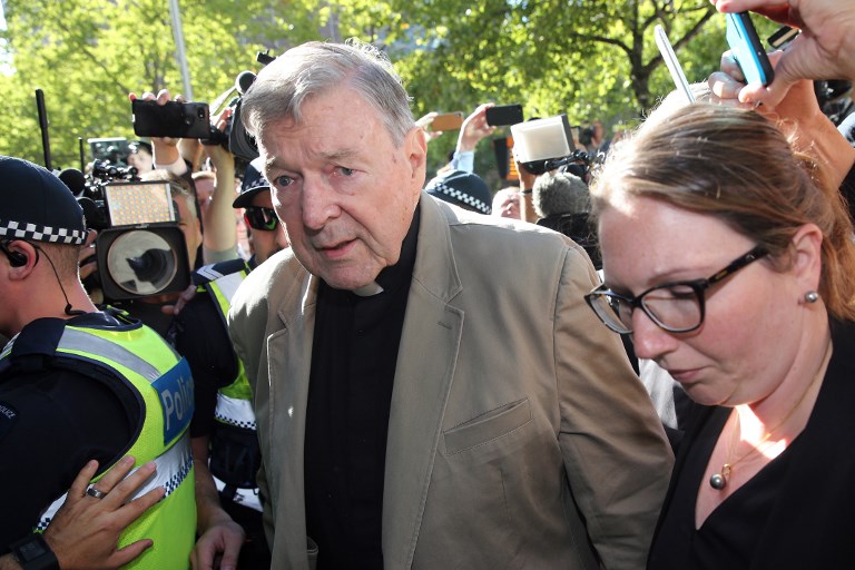 VATICAN PROBE. Cardinal George Pell (C) makes his way to the court in Melbourne on February 27, 2019. Photo by Con Chronis/AFP 