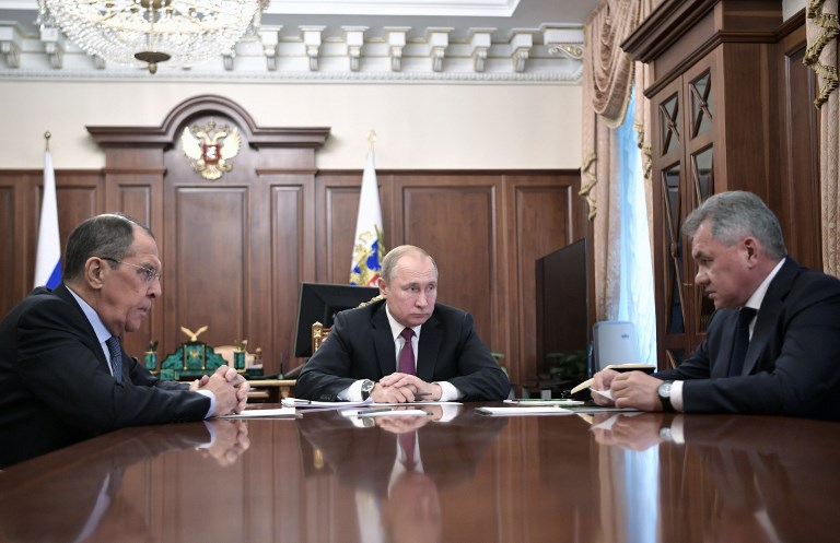 MEETING. Russia's President Vladimir Putin (C) attends a meeting with Russia's Foreign Minister Sergei Lavrov (L) and Defense Minister Sergei Shoigu in Moscow on February 2, 2019. Photo by Alexey Nikolsky/Sputnik/AFP 