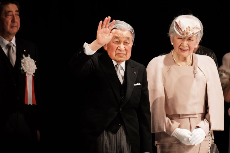 CORONATION ANNIVERSARY. Japanese Emperor Akihito (C) and Empress Michiko (R) leave the stage after a ceremony to mark the 30th anniversary of the monarch's coronation to the throne at the National Theatre in Tokyo on February 24, 2019. Photo by Nicolas Datiche/Pool/AFP 