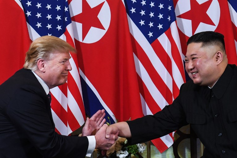 HANDSHAKE. US President Donald Trump shakes hands with North Korea's leader Kim Jong-un following a meeting at the Sofitel Legend Metropole hotel in Hanoi on February 27, 2019. Photo by Saul Loeb/AFP 