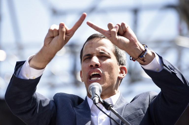 VENEZUELA. Opposition leader Juan Guaido gestures as he delivers a speech before thousands of supporters, in Caracas on February 2, 2019. File photo by Juan Barreto/AFP 