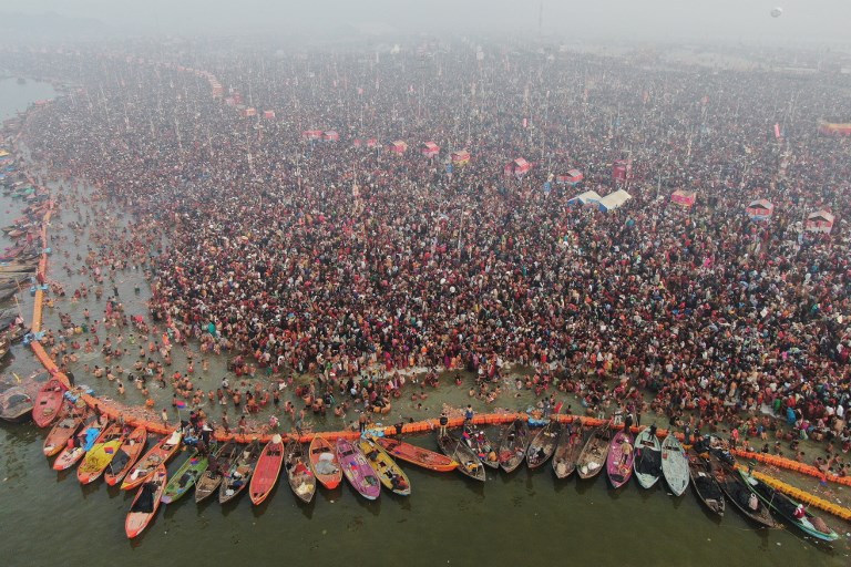 KUMBH MELA. This aerial handout photo taken on February 4, 2019 shows Indian Hindu devotees taking a holy dip at Sangam – the confluence of the Ganges, Yamuna and mythical Saraswati rivers – during the auspicious bathing day of 'Mauni Amavasya' at the Kumbh Mela in Allahabad. AFP PHOTO / UTTAR PRADESH INFORMATION AND PUBLIC RELATIONS DEPARTMENT  