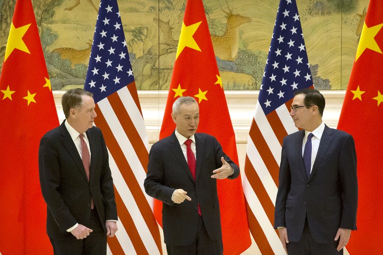 TRADE TALKS. US Trade Representative Robert Lighthizer, Chinese Vice Premier and lead trade negotiator Liu He and US Treasury Secretary Steven Mnuchin chat before the opening session of trade negotiations at the Diaoyutai State Guesthouse in Beijing on February 14, 2019. Photo by Mark Schiefelbein/AFP 
