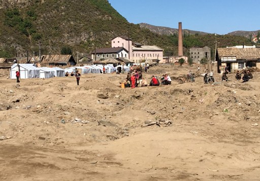 SECOND DISASTER? This handout photo received from the International Federation of Red Cross and Red Crescent Societies (IFRC) on October 3, 2016 and taken on September 30, 2016 shows a general view of the area during a visit by a Red Cross team in Musan County in North Korea's North Hamgyong Province after floods struck the area at the end of August 2016 causing widespread devastation across six counties. Handout photo by IFRC/AFP  