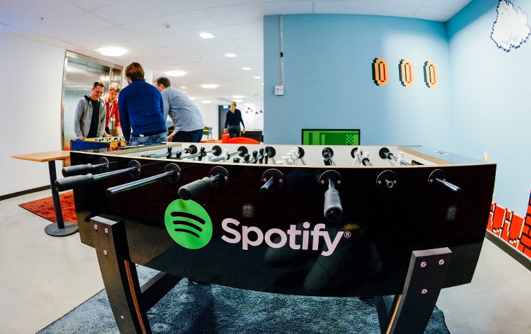 STREAMING LEADER. The Spotify logo is pictured on a football table placed in a playroom at the company headquarters in Stockholm on February 16, 2015. Photo by Jonathan Nackstrand/AFP  