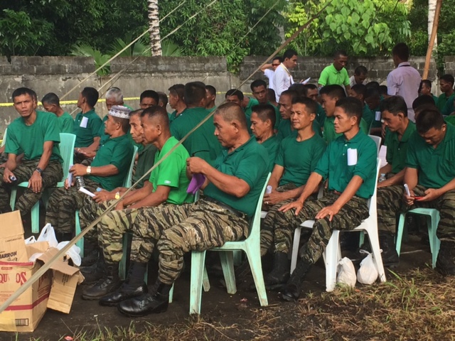 MORE THAN STATISTICS. MILF guerrillas turn over firearms to an independent body on Tuesday, June 16. Photo by Rappler 