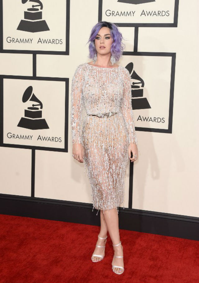 THAT PURPLE HAIR. She stuns in this white piece. Photo by Jason Merritt/Getty Images/AFP    