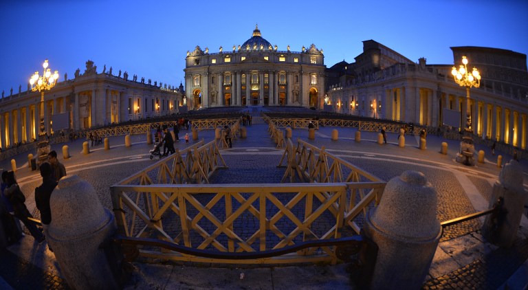 A picture shows St Peter's square and the basilica during sunset on March 29, 2014 at the Vatican. Andreas Solaro/AFP 