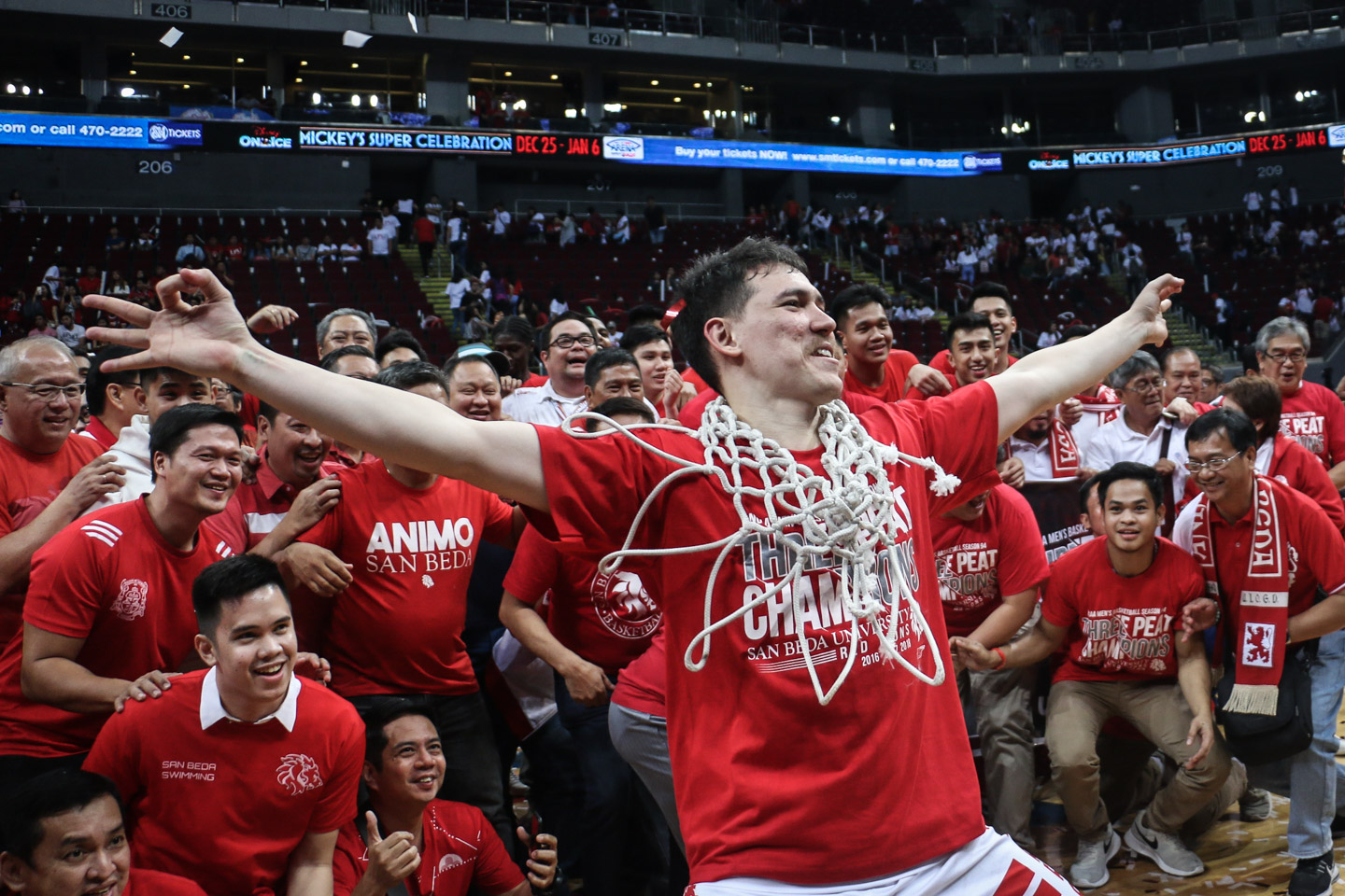 CHAMPS AGAIN. San Beda's Robert Bolick jubilates with the rest of the Red Lions who just won the NCAA Season 94 men's basketball title. Photo by Josh Albelda/Rappler 