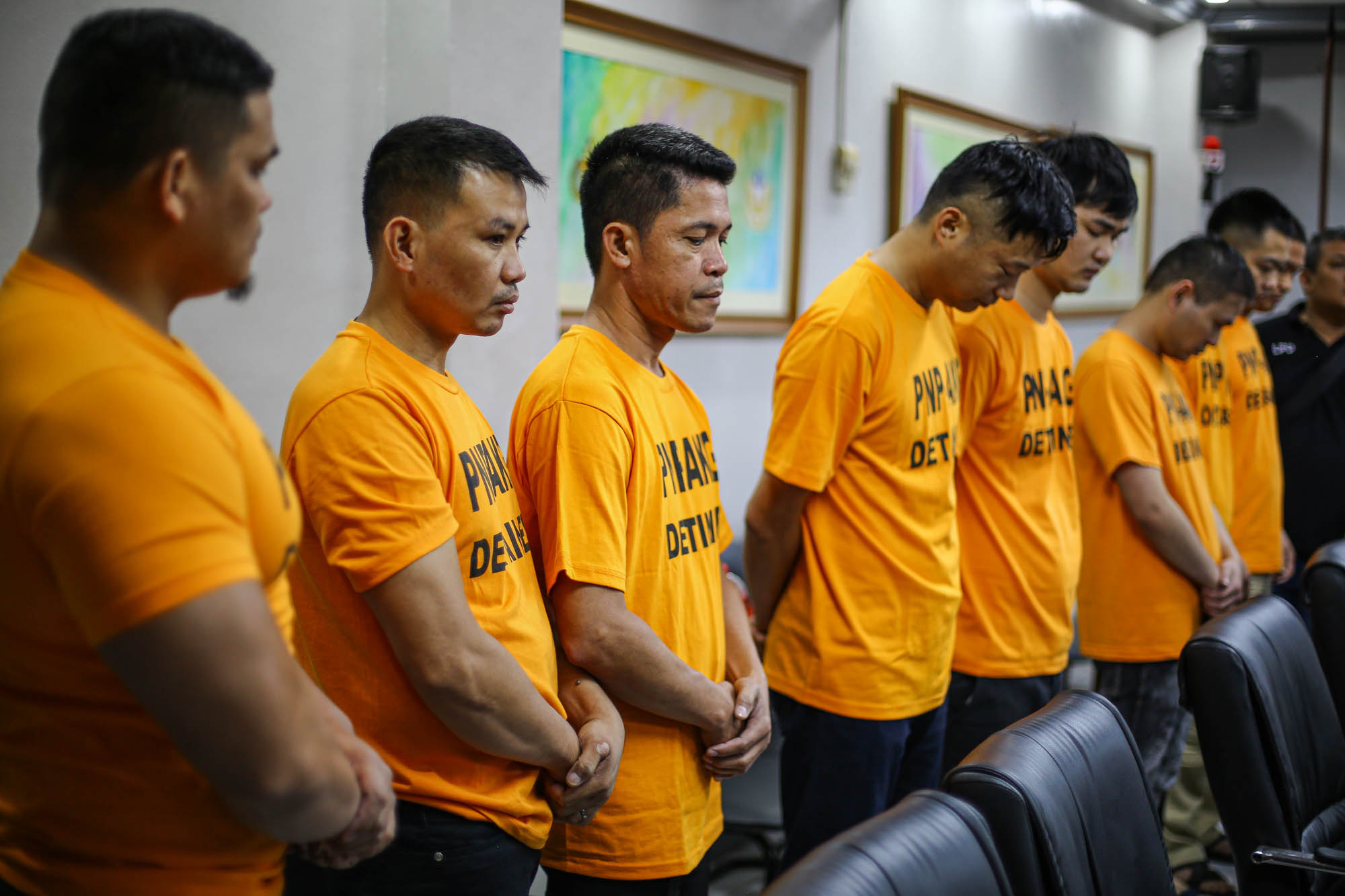 TARGETING CHINESE. The PNP Anti-Kidnapping Group presents to media at Camp Crame the 5 Chinese and 3 Filipinos suspected of kidnapping fellow-Chinese. File photo by Jire Carreon/Rappler 