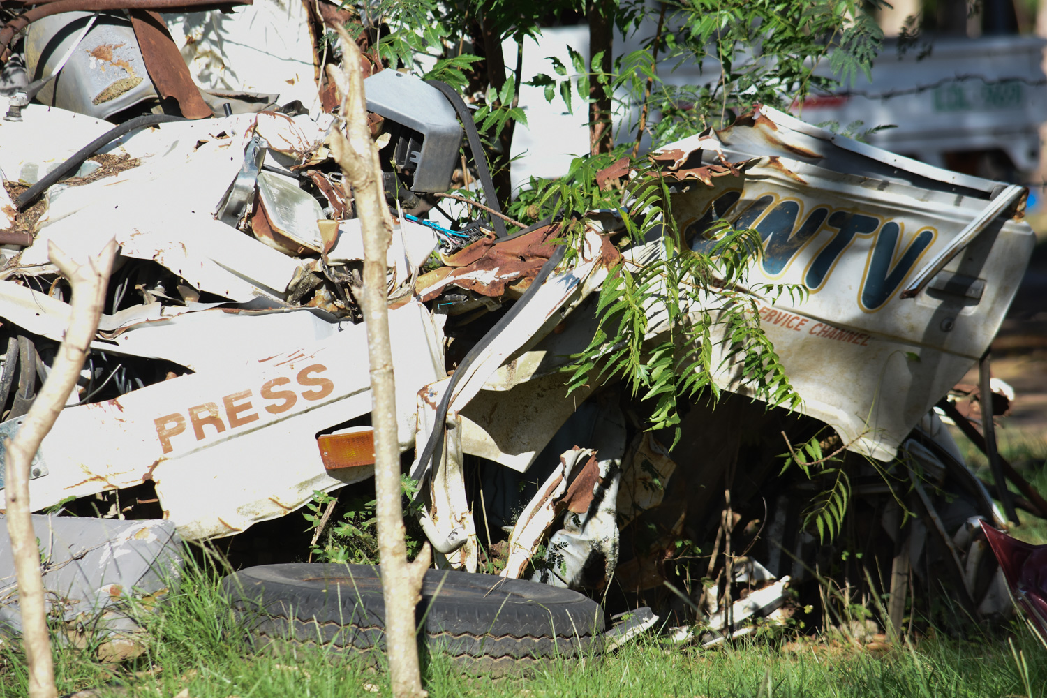 RUSTING. Crumpled vehicles of journalists killed in the Maguindanao massacre on November 23, 2009 are stored in a police compound. Photo courtesy of Edwin Espejo 