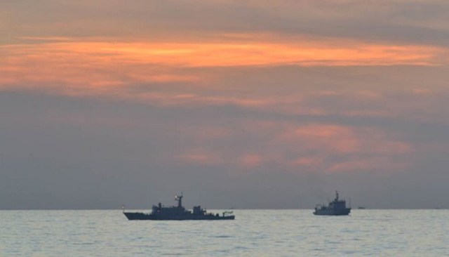 PHILIPPINE-CHINA DISPUTE. This undated file photo taken by the Philippine Navy and released April 11, 2012 by the Department of Foreign Affairs shows Chinese surveillance ships off Scarborough Shoal. 