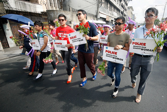 Representatives from different agencies led by the National Youth Commission chairperson Gio Tingson and commissioner Dingdong Dantes march towards the Welcome Rotonda in Quezon City wearing high heels to promote Pinay Power in observance of Women's Month on Friday, March 6. Photos by Ben Nabong/Rappler  