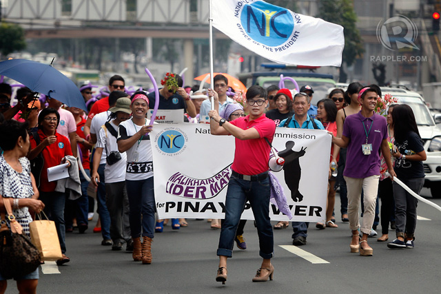 Representatives from different agencies led by the National Youth Commission chairperson Gio Tingson and commissioner Dingdong Dantes march towards the Welcome Rotonda in Quezon City wearing high heels to promote Pinay Power in observance of Women's Month on Friday, March 6. Photos by Ben Nabong/Rappler 
