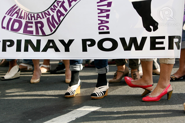Representatives from different agencies led by the National Youth Commission chairperson Gio Tingson and commissioner Dingdong Dantes march towards the Welcome Rotonda in Quezon City wearing high heels to promote Pinay Power in observance of Women's Month on Friday, March 6. Photos by Ben Nabong/Rappler 