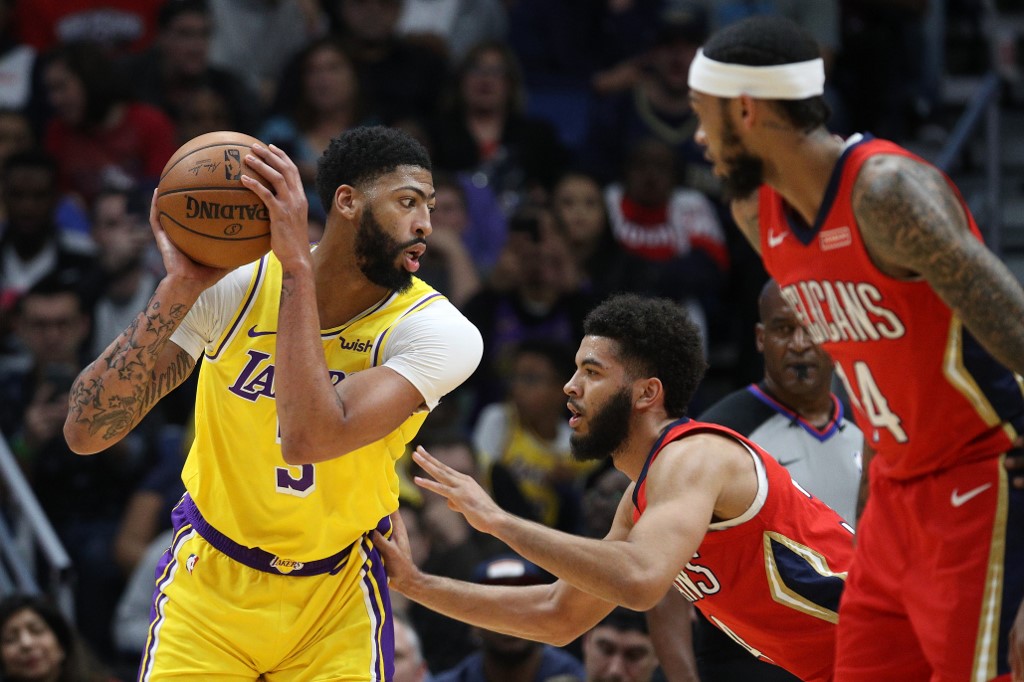 HOT RUN. Anthony Davis and the Lakers streak to their ninth straight victory. Photo by Chris Graythen/Getty Images/AFP  