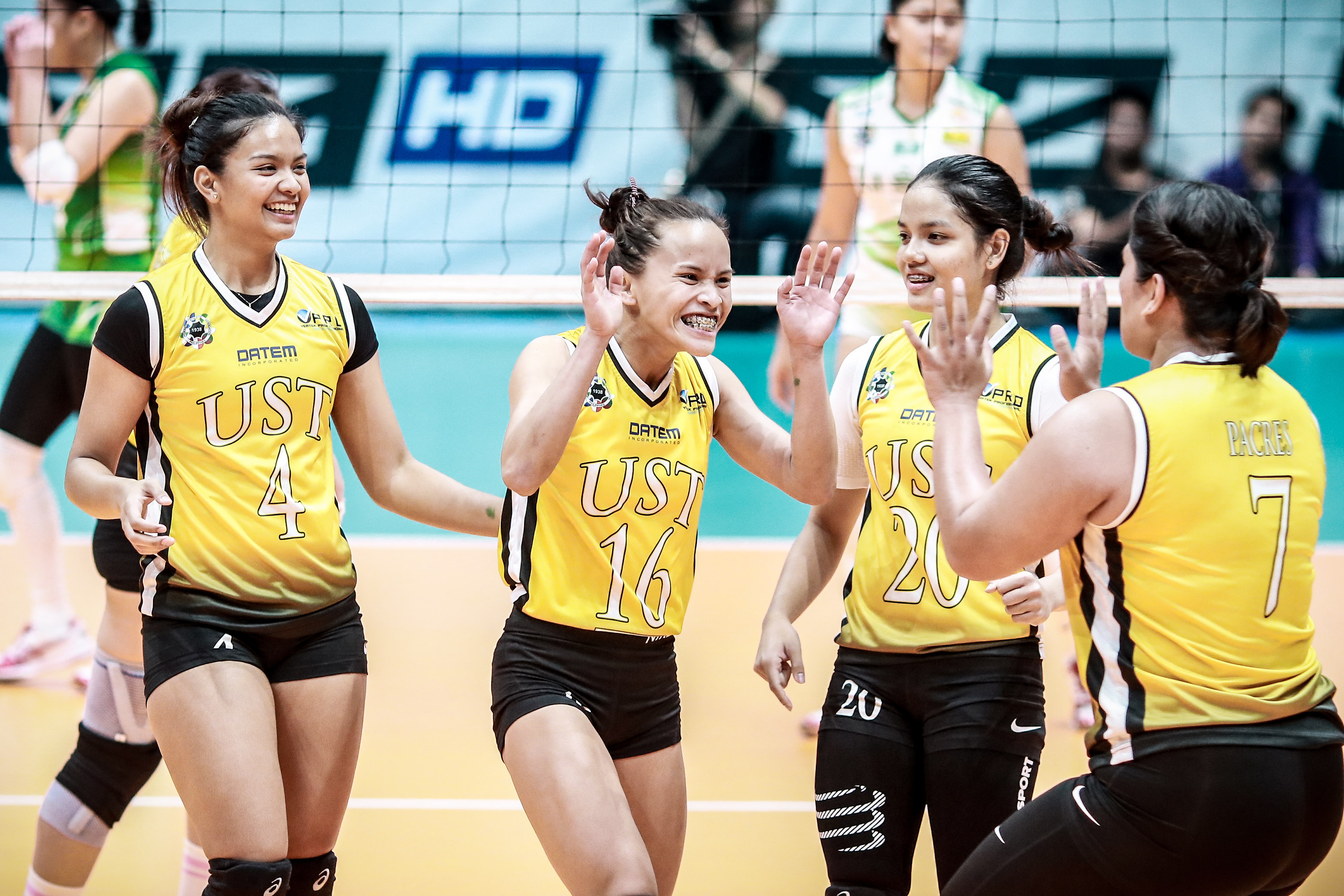 STUNNER. The UST Tigresses pull off a surprise win over the defending champions even minus a key cog. Photo by Michael Gatpandan/Rappler 