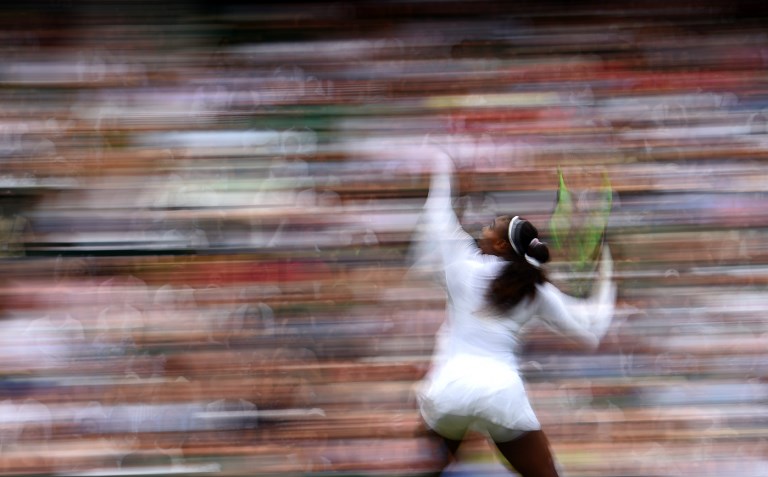 GAME ON. US player Serena Williams throws the ball to serve against Bulgaria's Viktoriya during their women's singles second round match on the third day of the 2018 Wimbledon Championships at The All England Lawn Tennis Club in Wimbledon, London, on July 4, 2018. Photo by Oli Scarff/AFP   