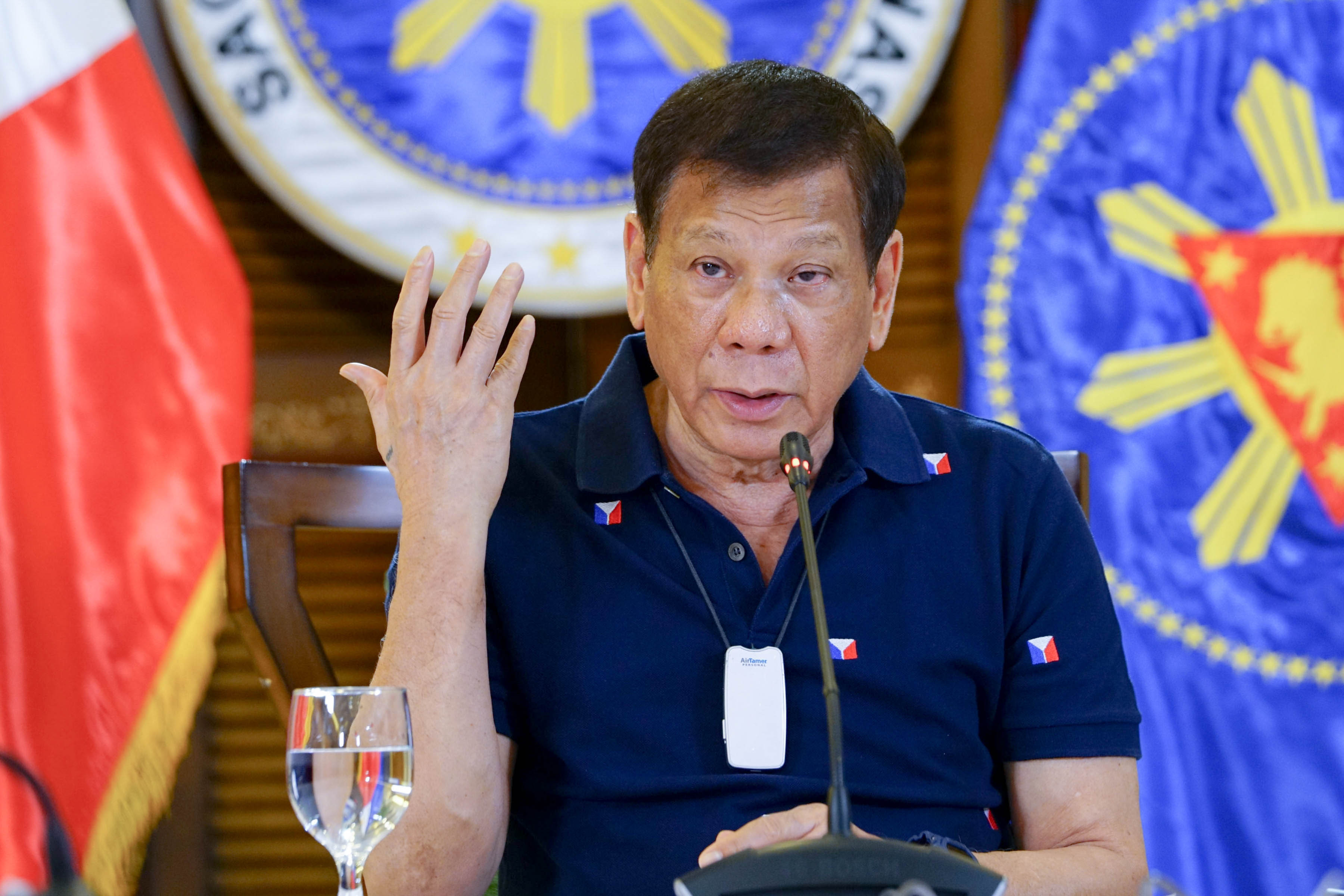 NEW POWERS. Amid a health crisis, President Rodrigo Duterte signs a law giving the executive branch more power to act against persons and groups falling under what critics say is a dangerous definition of terrorism. Malacañang  photo 