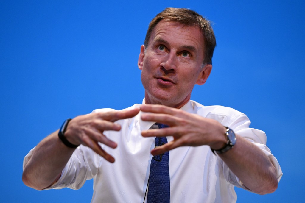 JEREMY HUNT. Britain's Foreign Secretary Jeremy Hunt gestures as he answers questions from journalist Iain Dale and the audience as he takes part in a Conservative Party leadership hustings event in Birmingham, central England on June 22, 2019. Photo by Oli Scarff/AFP 