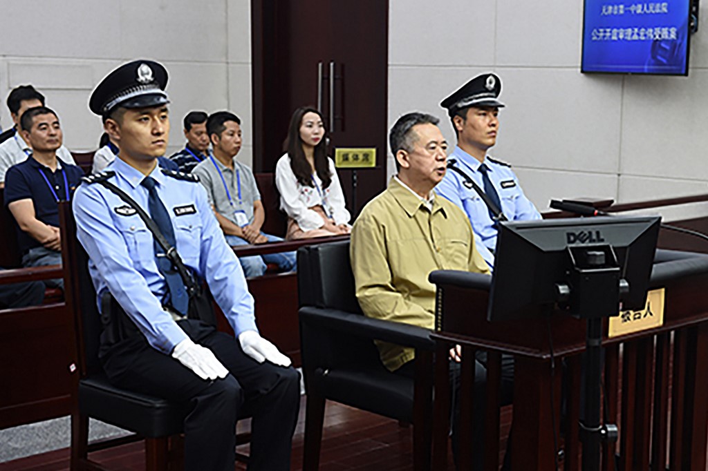 MENG HONGWEI. This handout photo taken on June 20, 2019 and released by the Tianjin No.1 Intermediate Court shows former Interpol chief Meng Hongwei (2nd R) during his trial at the court in Tianjin, northern China. Handout photo by Tianjin No.1 Intermediate Court/AFP 