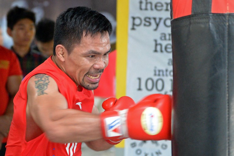 STILL AT IT. Retirement isn’t on the cards yet for Manny Pacquiao as he faces Adrien Broner a month after he turns 40. Photo by Ted Aljibe/AFP  