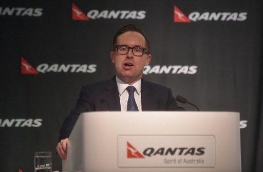 RECORD PROFITS. Qantas Chief Executive Officer Alan Joyce announces the airline's annual results in Sydney on August 24, 2016. Photo by Peter Parks/AFP 