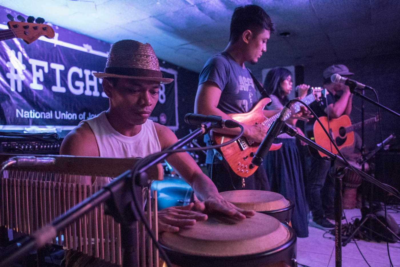BENEFIT CONCERT. Pasada joins the team of local artists in a benefit concert at Mow's Bar in Quezon City on Friday, November 22 for the families of the victims of the Ampatuan Massacre 10 years since the gruesome massacre killed 58 people – including 32 journalists. Photo by Lisa Marie David  