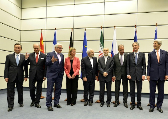 DEALMAKERS. (L-R) China's Wang Yi, French's Laurent Fabius, Germany's Frank-Walter Steinmeier, EU's Federica Mogherini, Iran's Mohammad Javad Zarif, Iran's Ambassador to IAEA Ali Akbar Salehi, Russia's Sergei Lavrov, Britain's Philip Hammond and US's John Kerry during a press conference in the course of the talks between the E3+3 (France, Germany, UK, China, Russia, US) and Iran in Vienna, Austria, 14 July 2015. Herbert Neubauer/EPA 