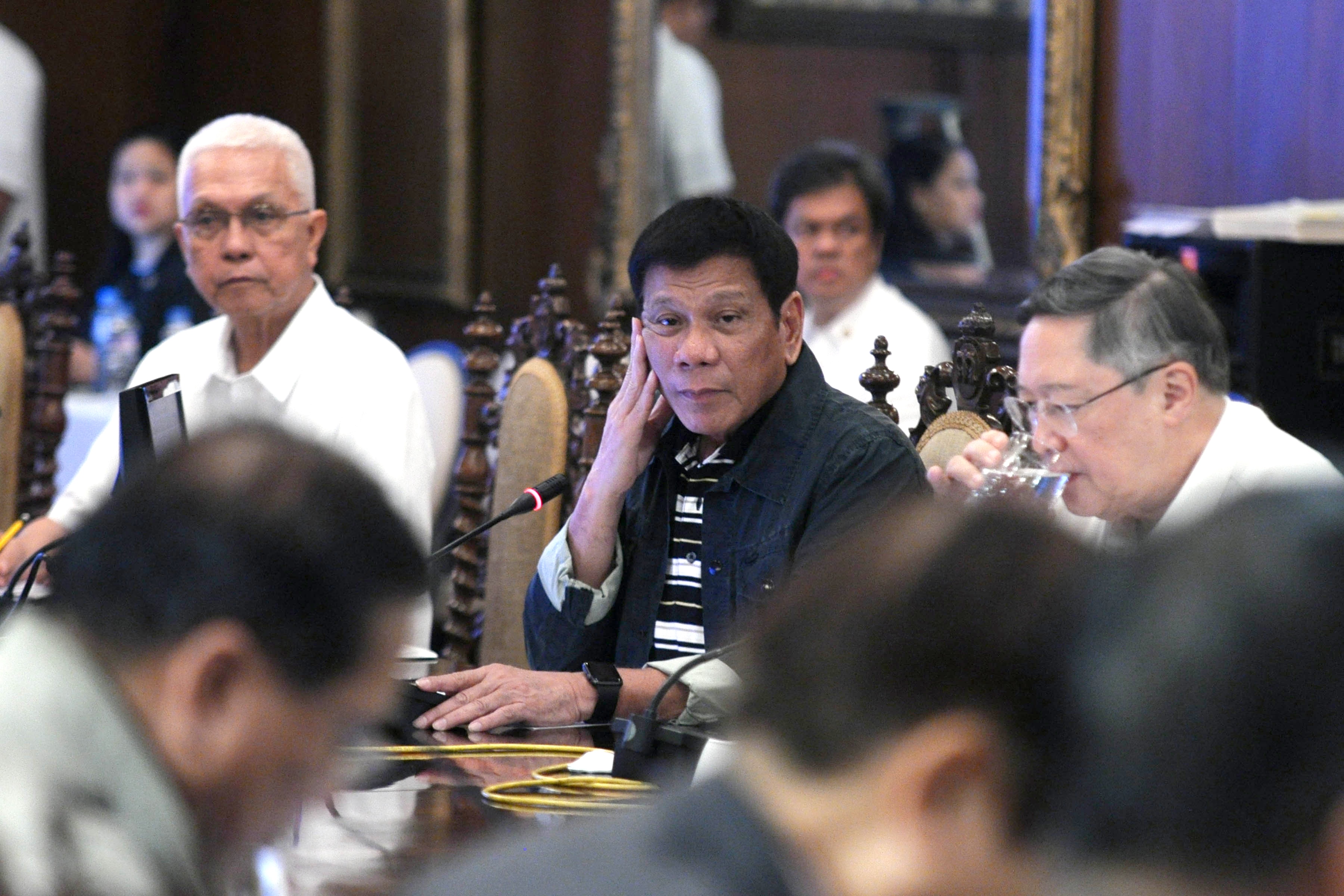DROP THE HONORIFICS. President Rodrigo Duterte (middle) doesn't want to be referred to as 'His Excellency.' Photo by King Rodriguez/Malacanang PPD  