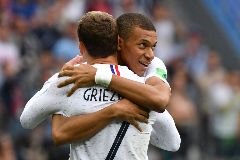 FRENCH BLISS. France's Antoine Griezmann celebrates his goal with teen sensation Kylian Mbappe. Photo by Dimitar Dilkoff/AFP  