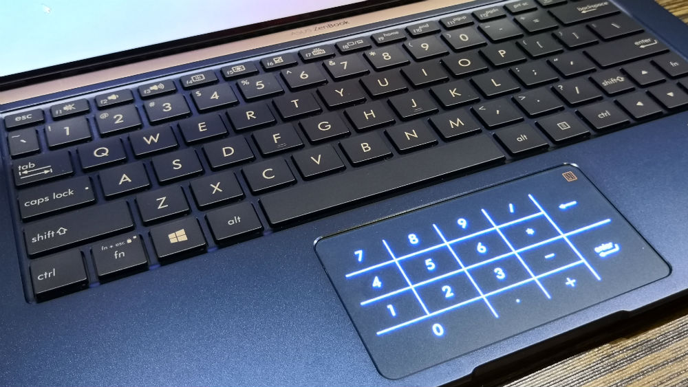 NUMPAD. The trackpad doubles as a numerical keypad in this series of Asus laptops. Photo by Kyle Chua/Rappler 