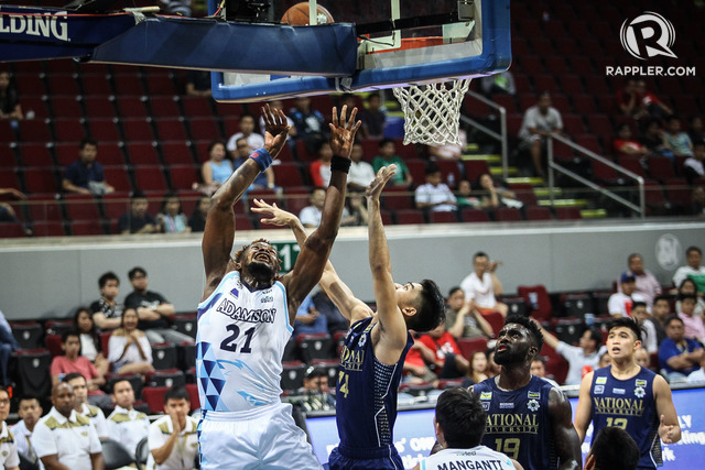 BIG DOES WORK. Papi Sarr (L) goes for a lay-up during Adamson