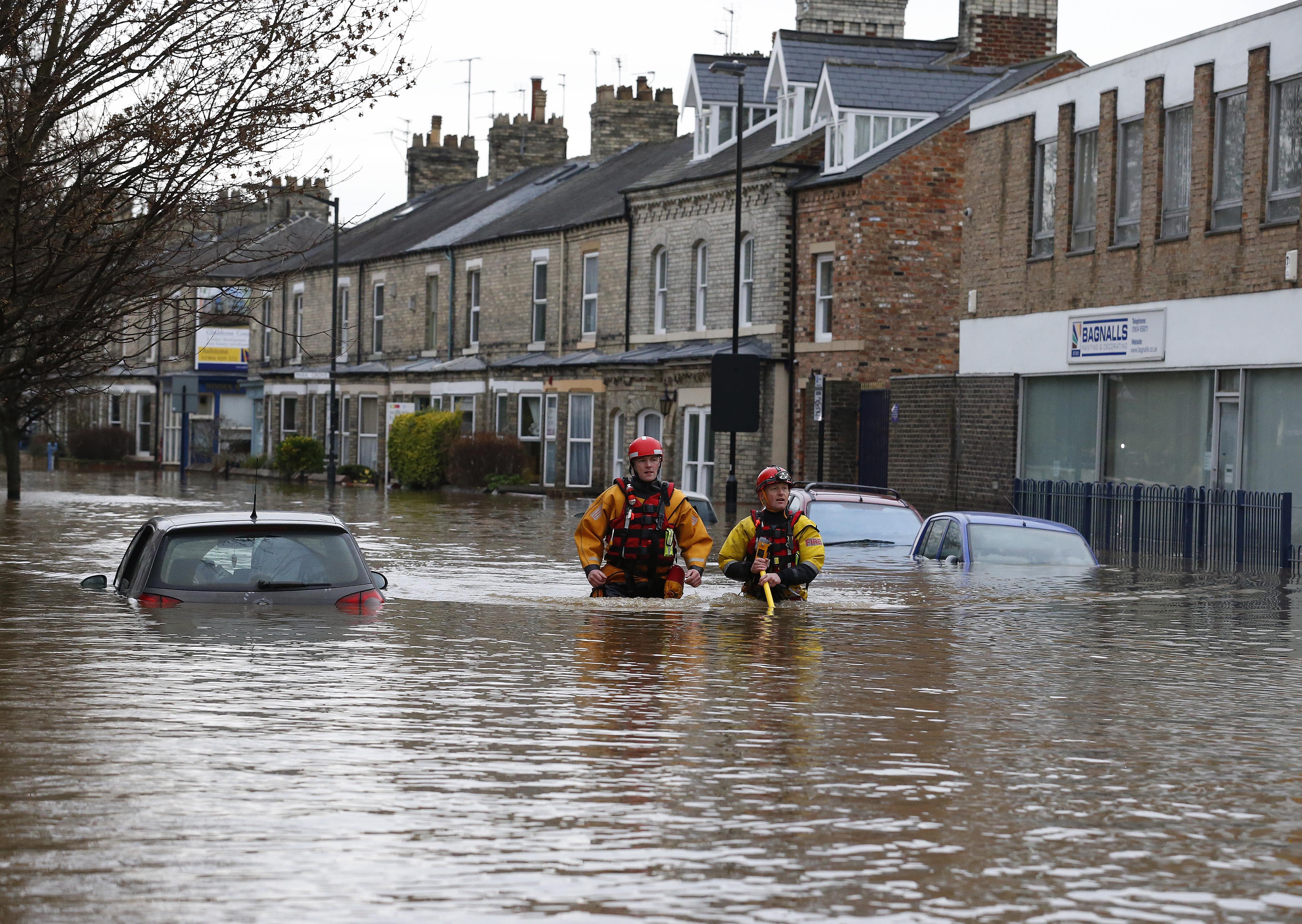 Britain's flood management chief quits after criticism.
