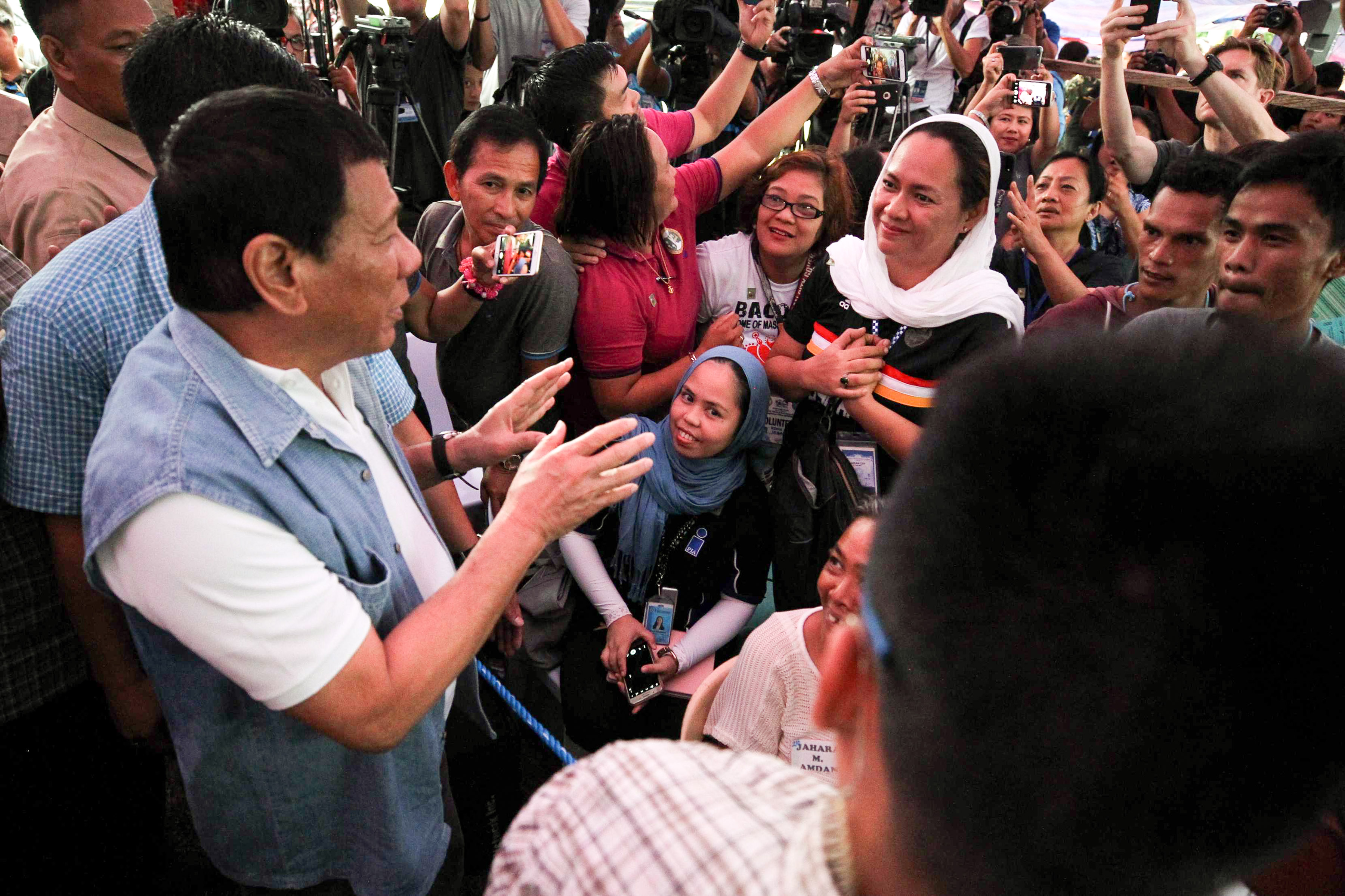 MARAWI CRISIS. President Rodrigo Duterte speaks to some of the evacuees from Marawi City during his visit to the Iligan City National School of Fisheries on June 20, 2017. Malacañang file photo  