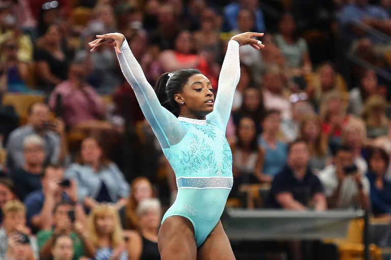 CONTINUED SUPPORT. USA national gymnasts like Olympic medalist Simone Biles will continue their training amidst federation dissolution. File Photo byTim Bradbury/Getty Images/AFP 