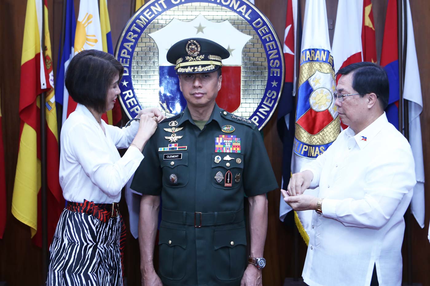 4TH STAR. Armed Forces of the Philippines Chief of Staff Lieutenant General Noel Clement is promoted to the rank of general and receives his 4th star from his wife Geraldine (left) and Defense Undersecretary Cardozo Luna (right) on October 30, 2019. Photo from the AFP  