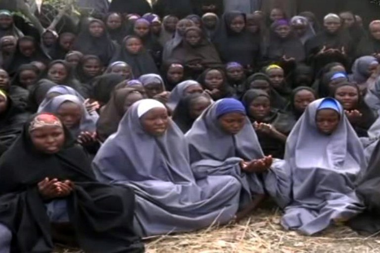CHIBOK ABDUCTION. This screengrab taken from a video on May 12, 2014 shows girls wearing the full-length hijab and praying in an undisclosed rural location. Boko Haram released the video claiming to show the missing Nigerian schoolgirls. Photo from AFP 