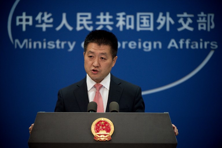 AFTER US SAIL-BY. In this file photo, Chinese Foreign Ministry spokesman Lu Kang speaks to the media during a press conference in Beijing on July 13, 2016. File photo by Nicolas Asfouri/AFP  