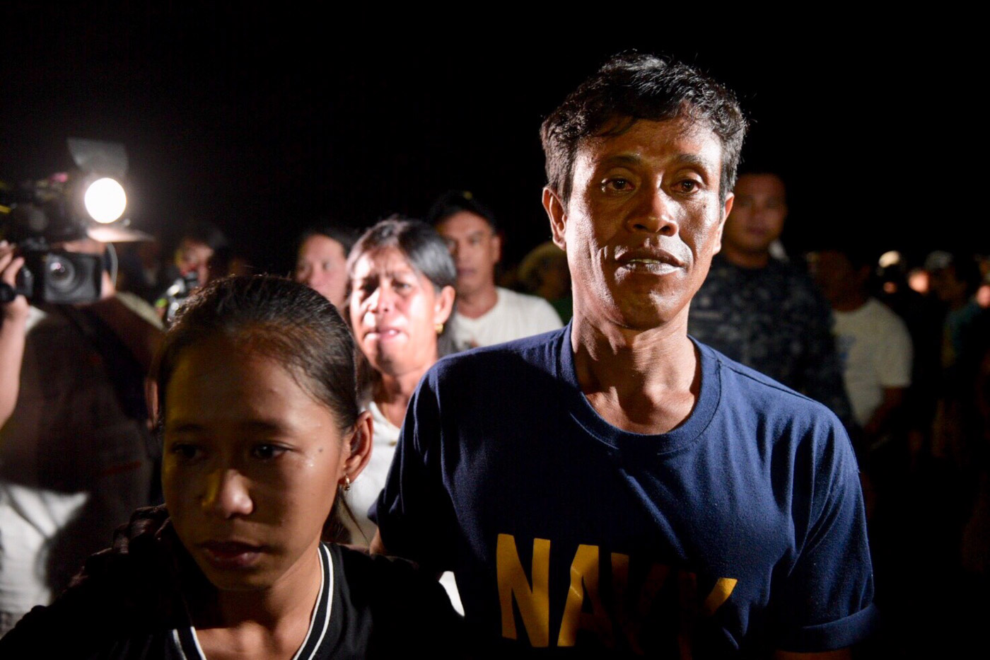 SURVIVORS. Fishermen of F/B Gem-Ver, the Philippine boat sunk by a Chinese vessel, reunite with their families upon their arrival at the Caminawit Pier in San Jose, Occidental Mindoro, on June 14, 2019. Photo by LeAnne Jazul/Rappler  