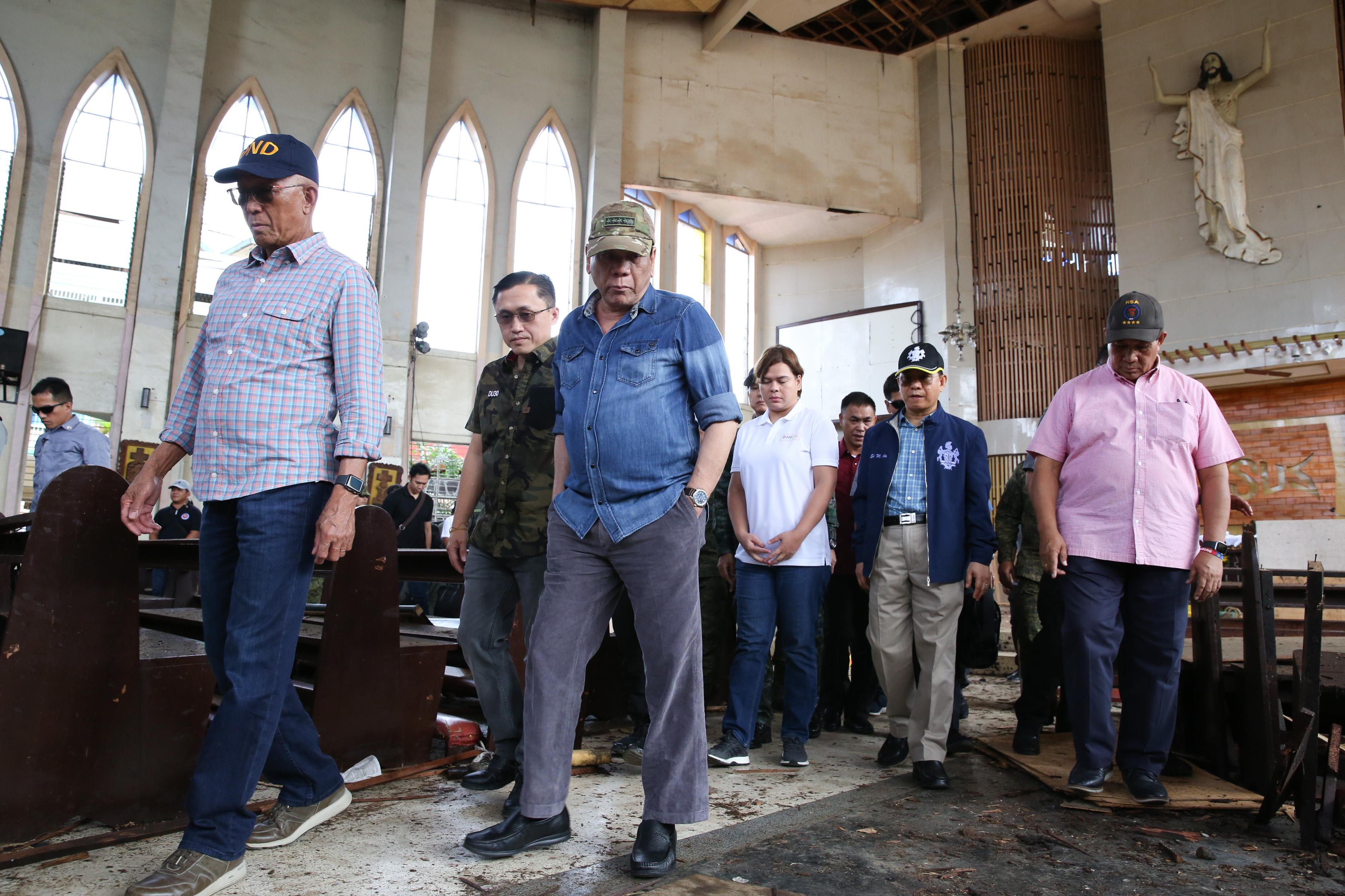 BLAST SITE. President Rodrigo Duterte conducts an inspection inside the Cathedral of Our Lady of Mount Carmel in Jolo, Sulu, on January 28, 2019. Malacañang photo   