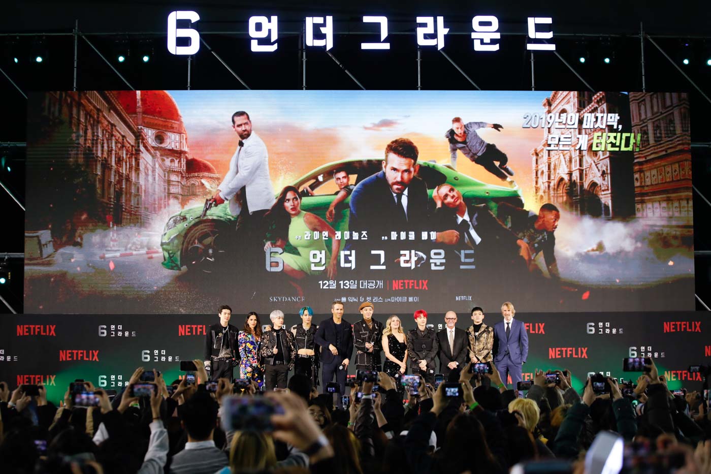 A star-filled night: 6 Underground director Michael Bay and cast led by Ryan Reynolds are joined by K-pop group EXO at the world premiere of the Netflix movie at the Dongdaemun Design Plaza on December 02, 2019 in Seoul, South Korea. Photo courtesy of Netflix 