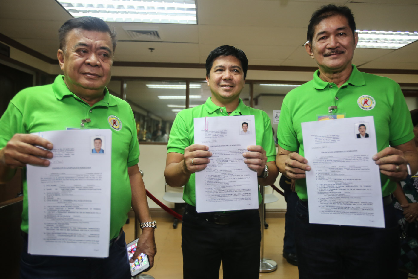 ANOTHER STINT. Former Quezon City representative Mike Defensor, along with Emmanuel Andal and Adorlito Ginete, file their certificates of acceptance of nomination under Anakalusugan. Photo by Ben Nabong/Rappler  